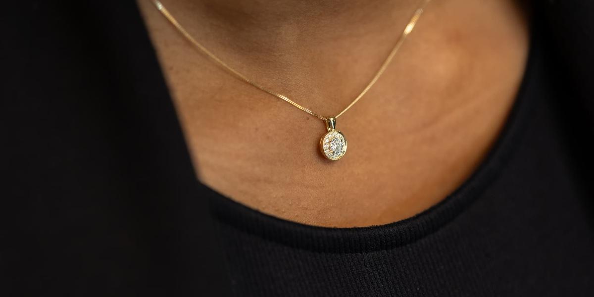 Glacier Fire Canadian diamond pendant in yellow gold worn on a necklace