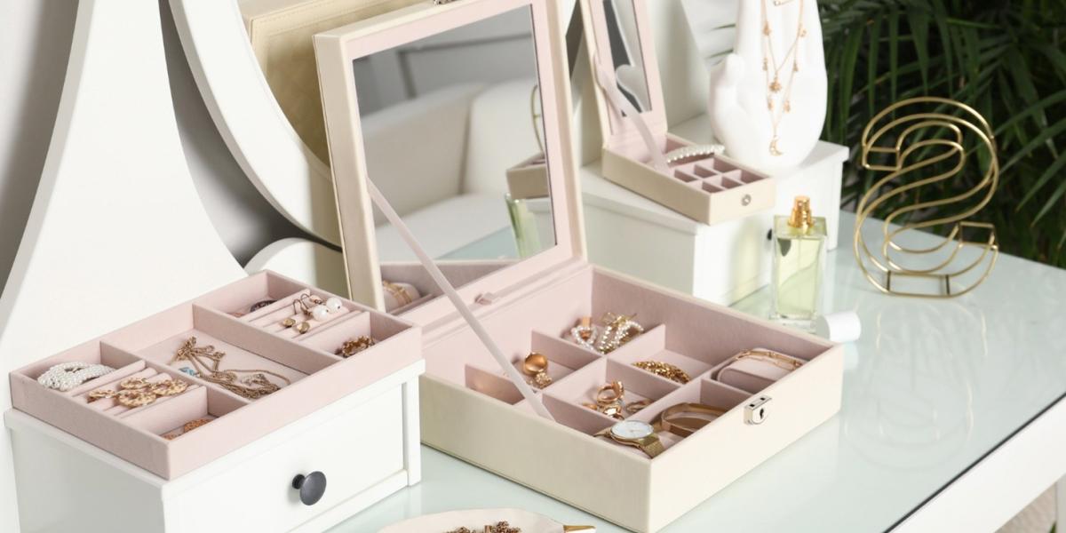 Jewellery storage boxes organizing rings, necklaces and accessories on a vanity table