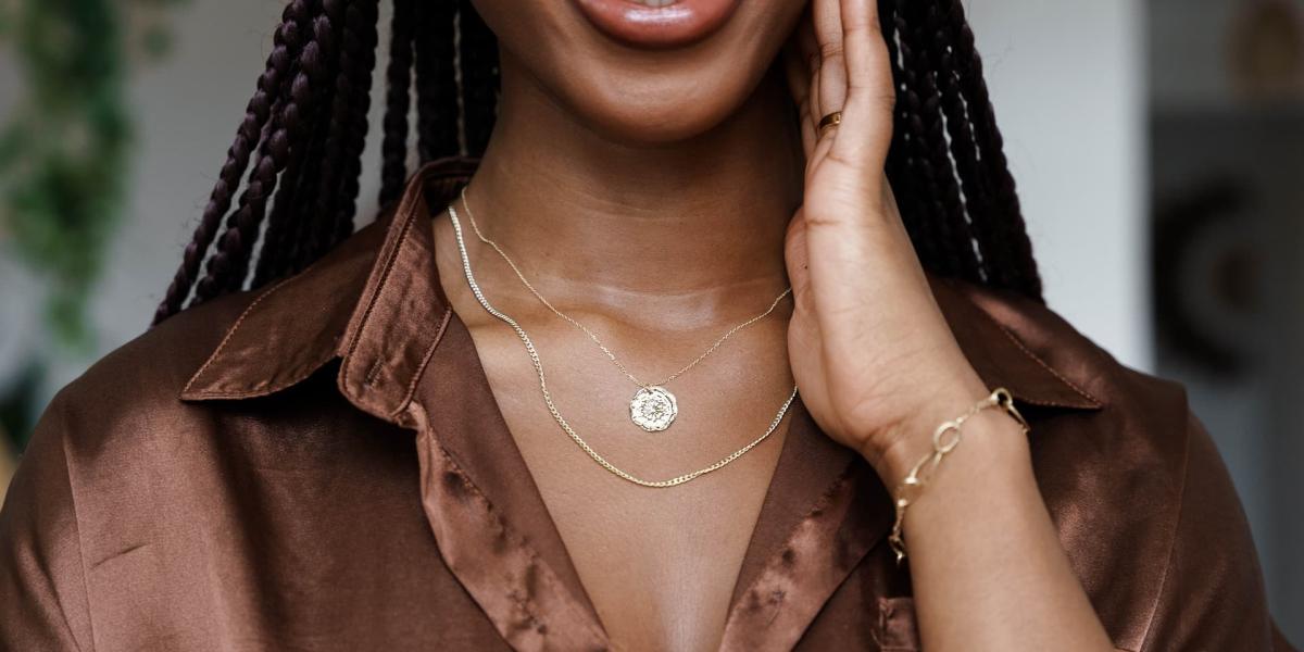 woman wearing elegant necklaces and bracelets