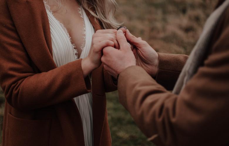 Couple holding hands