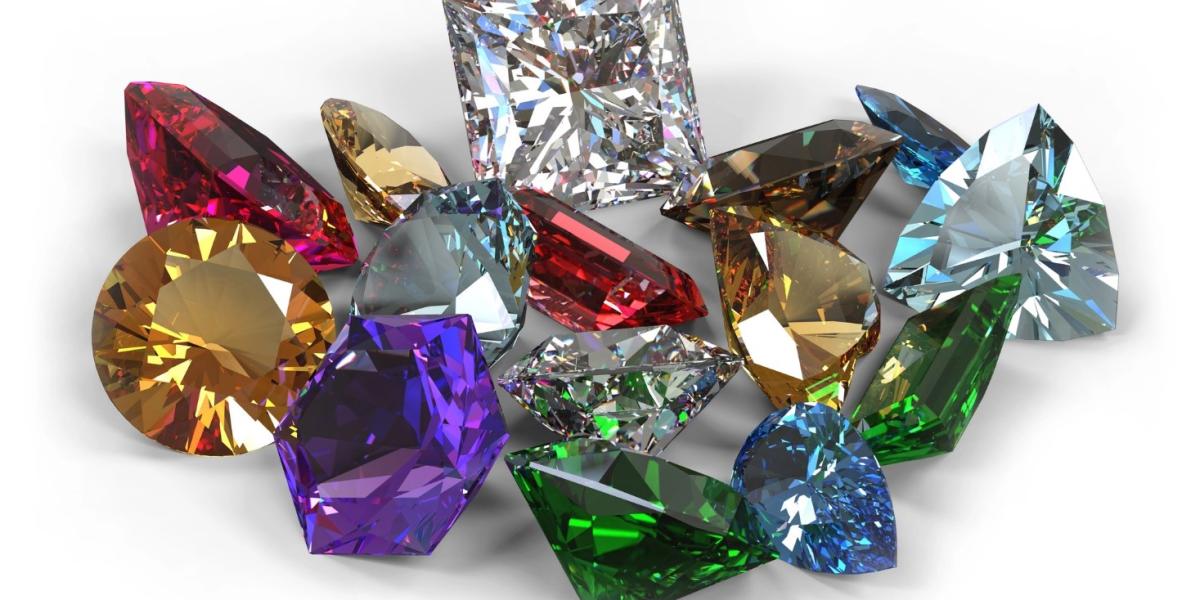 A collection of colorful gemstones in various shapes and cuts.
